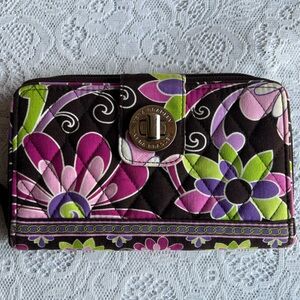 Vera Bradley wallet features the Purple Punch pattern.